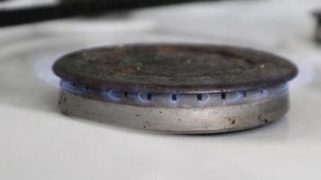 The gas burner turns off on the kitchen stove for cooking. Turn off the kitchen gas stove. Natural gas concept. Russia has stopped deliveries of natural gas to Ukraine. video