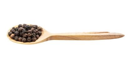 hainan black pepper in wooden spoon isolated photo