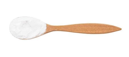 top view of potato starch in wood spoon isolated photo