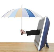 arm with umbrella pops out TV screen photo