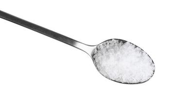 top view of steel teaspoon with coarse Sea Salt photo