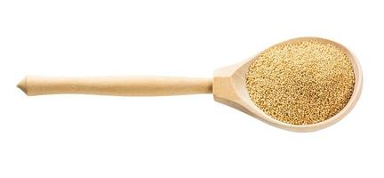 wooden spoon with raw amaranth grains isolated photo