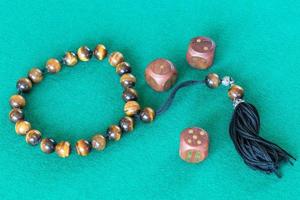 worry beads and three dices with various points photo