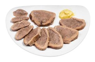 portion of sliced boiled beef tongue isolated photo