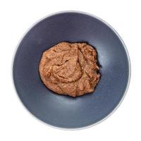 top view of porridge from teff grains in gray bowl photo