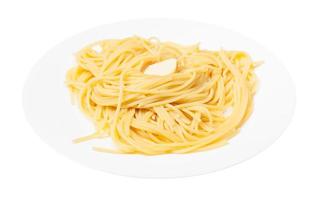 pasta with butter on white plate isolated photo