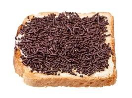 toast with butter and chocolate sprinkles isolated photo