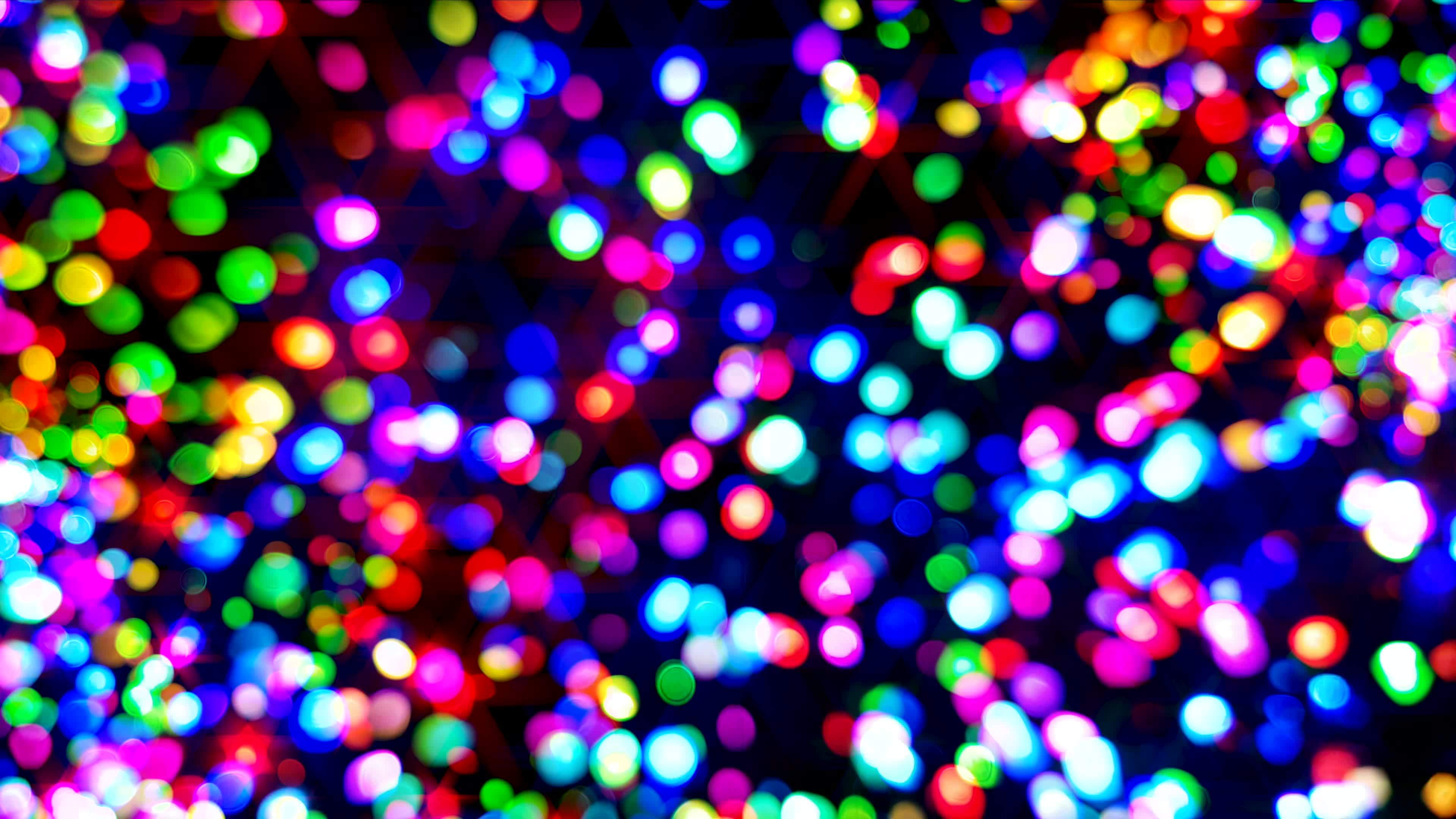 A loopable composite shot of RGB colour changing out of focus bokeh