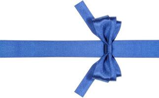 symmetric blue bow with square cut ends on ribbon photo