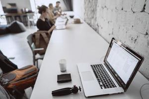 Empty workplace with different objects, a man moved away photo