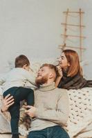 Mom, Dad and Little Son Spends Time Together photo