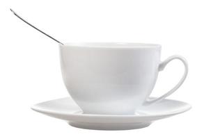 side view of white cup with spoon and saucer photo