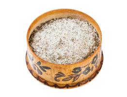 wooden salt cellar with seasoned salt with spices photo