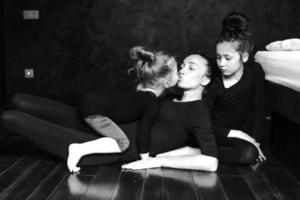 Mom and two daughters spend time together photo