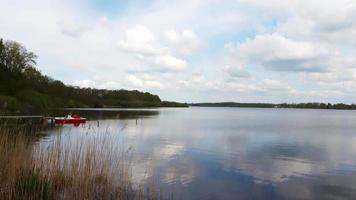 Beautiful landscape at a lake with a reflective water surface video