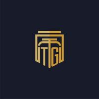 logotipo de monograma inicial de tg elegante con diseño de estilo de escudo para mural de juegos de bufete de abogados vector