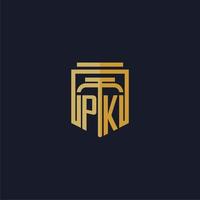 logotipo de monograma inicial de pk elegante con diseño de estilo de escudo para mural de juegos de bufete de abogados vector