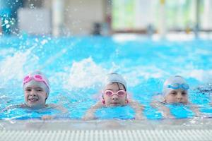 children group  at swimming pool photo