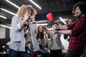 multiethnics business team boxing at office photo