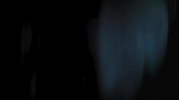 material de archivo de animación de fondo de efecto de fugas orgánicas ligeras. las fugas de luz de la lente parpadean haciendo una elegante animación de fondo abstracto. fuga de luz clásica en 4k video