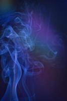 Smoky clouds on dark ground photo