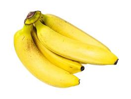 varios plátanos amarillos maduros aislados en blanco foto