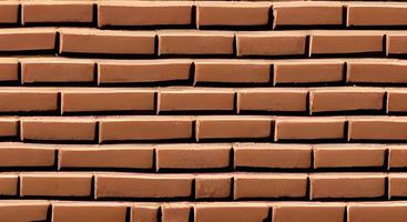 red brick wall texture grunge background with vignetted corners, may use to interior design photo