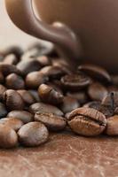 Coffee cup and roasted coffee beans photo