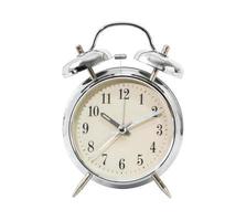 Silver alarm clock  on white photo