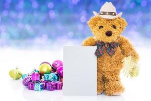 Teddy bear with gifts and ornaments new year photo
