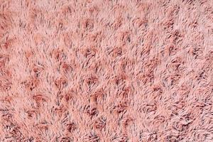 Closeup textile pink abstract background photo