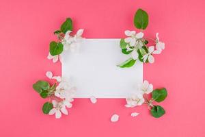 Blank frame mockup with white flowers photo