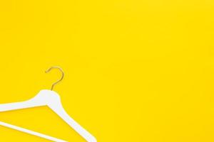 White hangers background for sale shopping concept photo