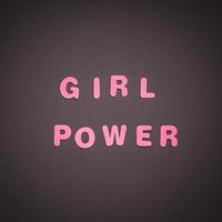 GIRL POWER writing on black paper background photo