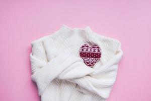 Valentine day composition with white sweater photo