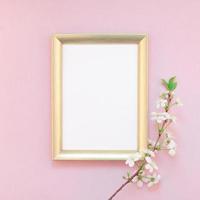 Blank frame mockup with white flowers photo