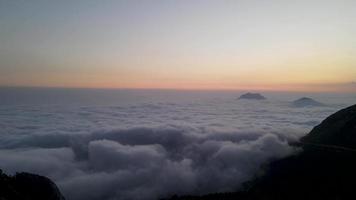 sunrise or sunset at the cloud inversion. Travel, sport and active life concept video