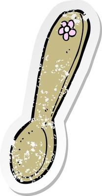 retro distressed sticker of a cartoon spoon