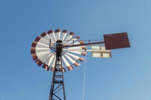 blue sky and wind turbine photo