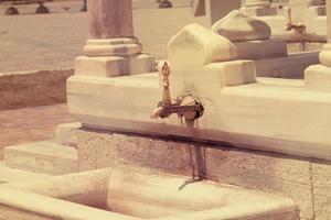 Old historical stone fountain photo