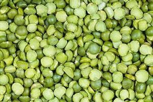 background - raw dried green split peas photo