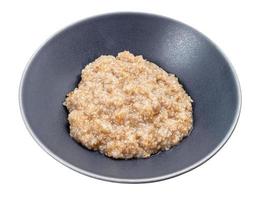 boiled porridge from crushed rye groats in bowl photo