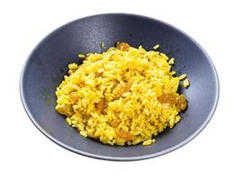 cooked sweet yellow rice porridge with turmeric photo