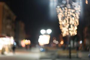 Night city street lights bokeh background photo