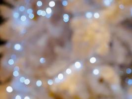 Christmas tree blurred background with bokeh photo