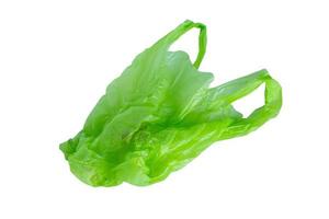 green plastic bag isolated on white background with clipping path photo