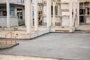 House building, concrete floor under construction photo