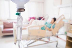 Patient on bed in Hospital Room interior for background photo