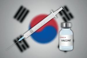 Syringe and vaccine vial on blur background with South Korea fla vector