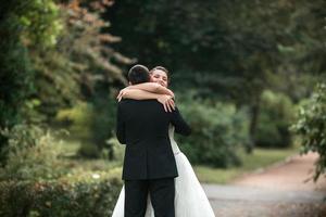 Beautiful wedding couple posing photo